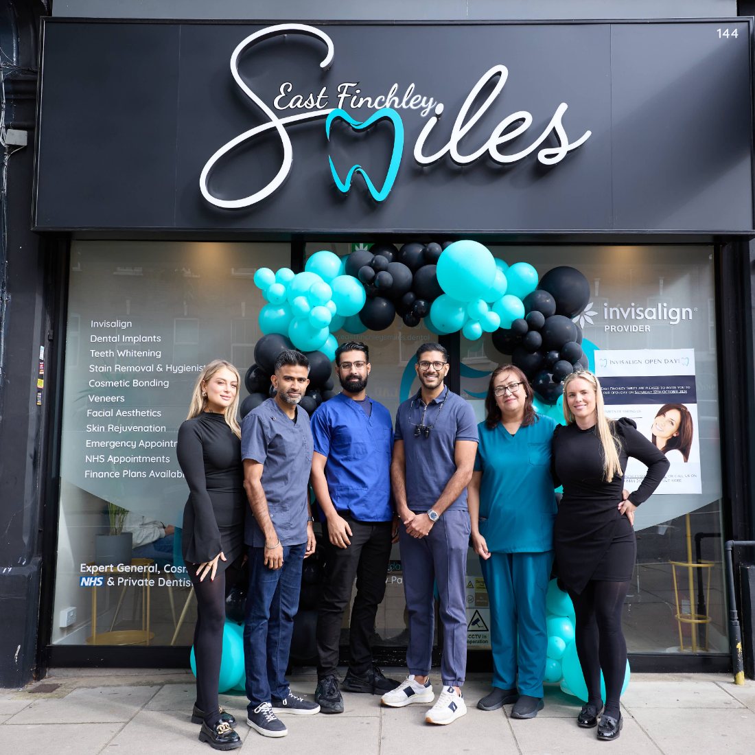 The East Finchley Smiles team outside the practice on the High Road